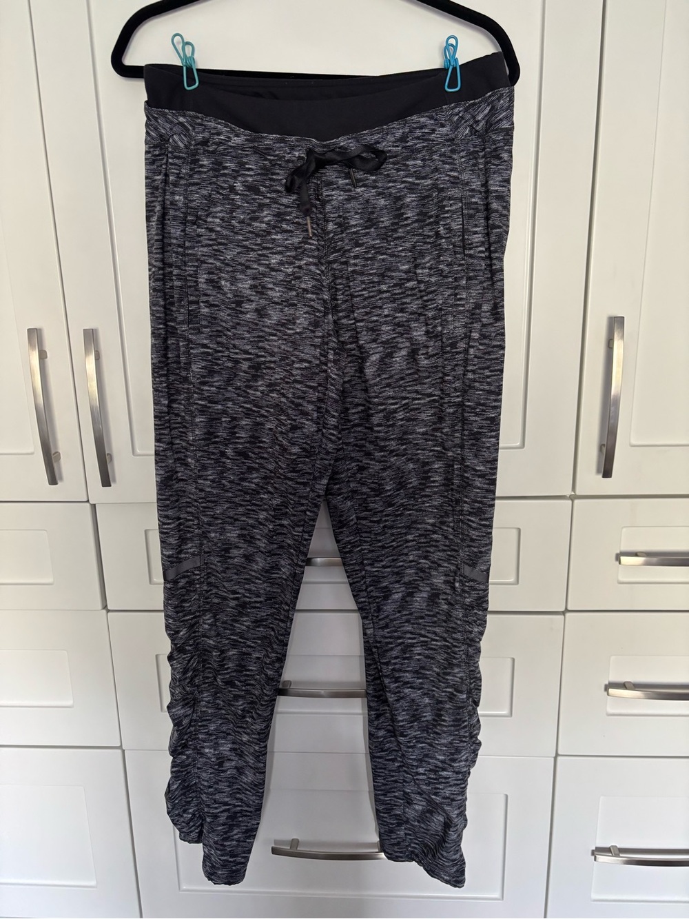Heathered Black Drawstring Lululemon Pants. Lined with leggings